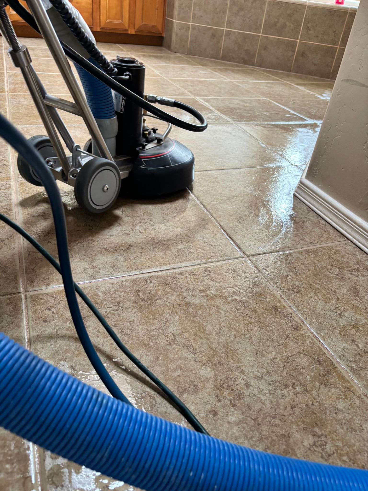 Tile and grout cleaning process in Las Cruces NM – hot water extraction and rotary scrubbing restoring tile floors